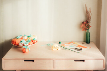 Desk with materials for making crafts out of paper, diy at homa concept