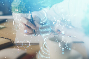 DNA theme hologram over woman's hands writing background. Concept of education. Double exposure