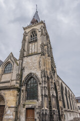 Fototapeta na wymiar Fragment of Amiens Church of Saint-Leu, dedicated to Bishop of Sens - Saint Leu. Built in 1481, church of Saint Leu is one of the twelve ancient Amiens parishes. Amiens, Somme, Picardie, France.