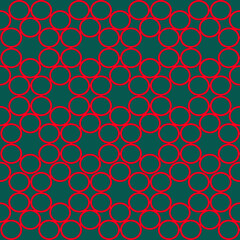 Abstract red circles on green seamless pattern