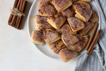Triangles or angles cottage cheese cookies with sugar and cinnamon. Goose feet cookies. Ideas for children dessert or snack.