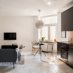 Living room and kitchen with table