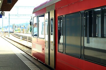 Train in the train station. Railway station. Modern high speed train.