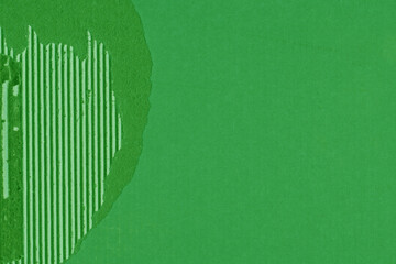 A green vintage rough sheet of carton. Recycled environmentally friendly cardboard paper texture. Simple and bright minimalist papercraft background.