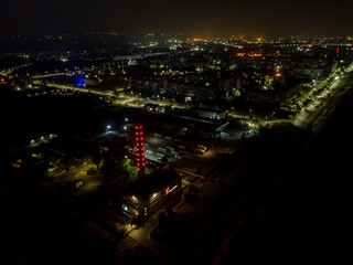 Obraz premium Aerial photo of city lights at night small town