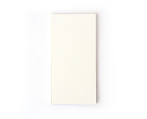 Blank mini book top view on white desk background