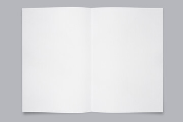 Paper a5 size top view or brochure mockup template on grey desk background. 