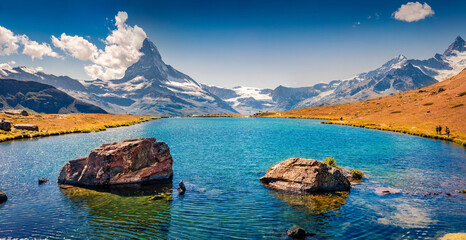 Attractive summer view of Stellisee lake. Great outdoor scene with Matterhorn (Monte Cervino, Mont...