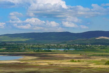 Fototapeta premium beautiful view of pasture and hills in the rays of the summer sun
