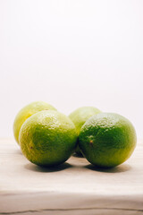 Real limes on white background