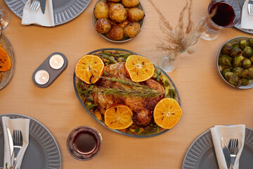 Top view background of delicious roasted chicken at Thanksgiving table ready for dinner party with friends and family