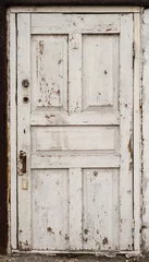 Fotobehang Oude deur Old rough door with white weathered paint - grungy textured background