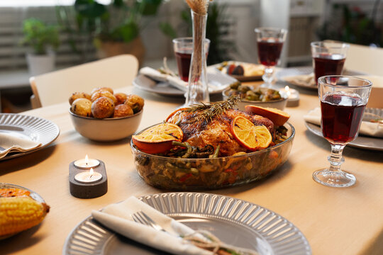 Background image of delicious roasted chicken at Thanksgiving table ready for dinner party with friends and family