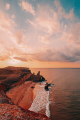 Colorful sunset on the rocky sea coast
