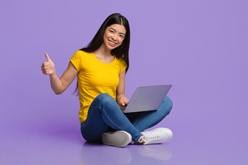 Remote Jobs For Students. Asian Woman Sitting With Laptop, Showing Thumb Up