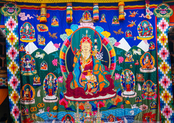 Fototapeta na wymiar Bhutan in the village of Bumthang, beautiful rare holy curtain. A silken Patchwork and embroidery piece, temporary exposed on the yearly festival of Jakar.