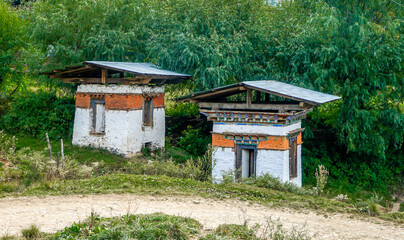 Eastern Bhutan, In the Tang Valley, two small watermills on a little trail