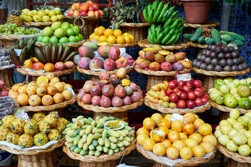 Fresh exotic fruits in Mercado Dos Lavradores traditional market. Funchal, Madeira island, Portugal