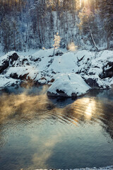 The blue lakes of the Katun river in winter