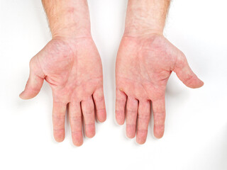 male hands palm brushes on white background