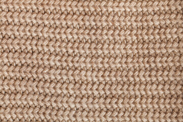 Wool knitted fabric background, winter background. Flatlay