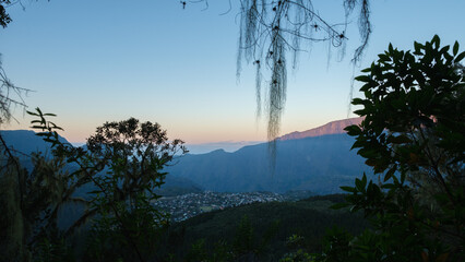Sunrise on Cilaos city in the Jungle of Reunion Island