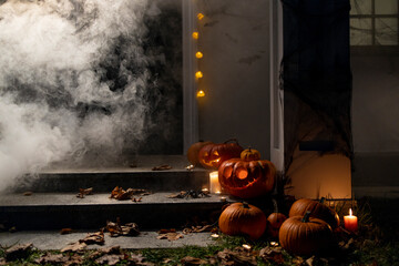 View of a house porch entrance door decorated for a Halloween celebration