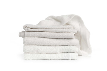 several white beach cotton towels folded on white background