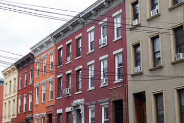 Fototapeta na wymiar Row of Colorful Old Brick Residential Buildings in Williamsburg Brooklyn