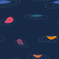 Leaves on the water seamless pattern. The stylized image of fallen leaves on a dark background.
