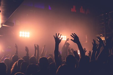 crowd of people dancing at concert