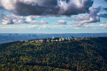 Aerial view of Burnaby Mountain during a vibrant morning. Taken in Greater Vancouver, British Columbia, Canada. Modern City viewed from Above.