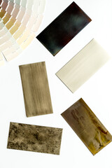 Choosing cabinet panel and countertop material with color scheme. Above view