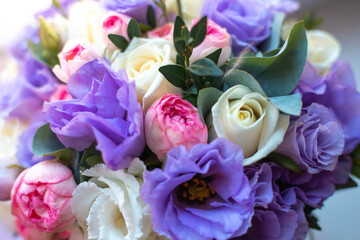 beautiful bright bouquet of small roses, delicate background of flowers