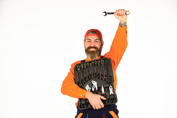 Man in uniform carries toolbox white background. Worker repairer repairman handyman carrying toolbox. Handyman concept. Professional equipment. Really good tools. What to Carry in Your Car Toolbox
