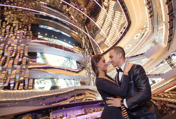 Beautiful gorgeous couple in elegant formal wear. Sexual passionate couple wearing evening dress...