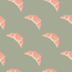 Seamless minimalistic seamless pattern with croissants. France dessert pink ornament on grey background.