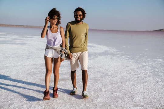 Loving young african couple walking