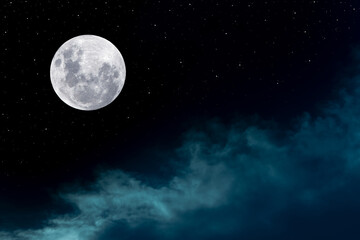 Naklejka na ściany i meble Full moon over silhouette clouds in the night.