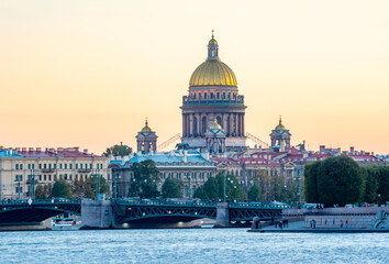 Fototapeta na wymiar St. Isaac's Cathedral and Palace bridge at sunset, Saint Petersburg, Russia