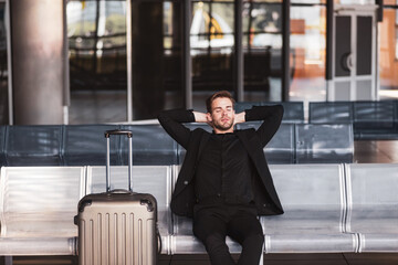 Man waiting for his flightin the airport