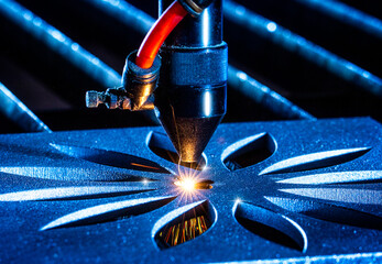 Laser machine cuts plywood close up