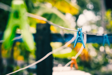 Clothespin on the clothesline. Selective focus