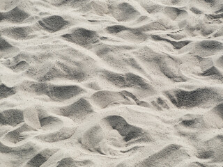 Closeup of beach sand texture. Natural background