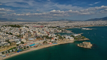 Fototapeta premium Aerial drone panoramic photo of iconic round port and marina of Zea in the heart of Piraeus with beautiful sky and clouds, Attica, Greece