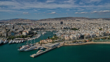 Fototapeta na wymiar Aerial drone panoramic photo of iconic round port and marina of Zea in the heart of Piraeus with beautiful sky and clouds, Attica, Greece
