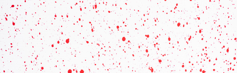 Fototapeta na wymiar top view of abstract red paint stains on white background, panoramic shot