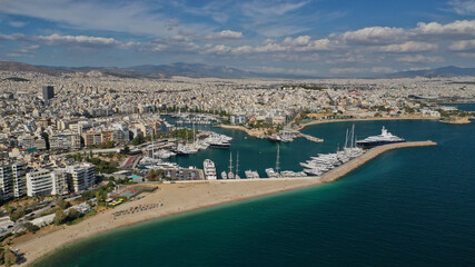 Aerial drone panoramic photo of iconic round port and marina of Zea in the heart of Piraeus with beautiful sky and clouds, Attica, Greece