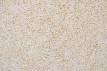 Decorative stucco wall of the house.