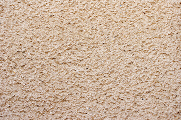 Decorative stucco wall of the house.
